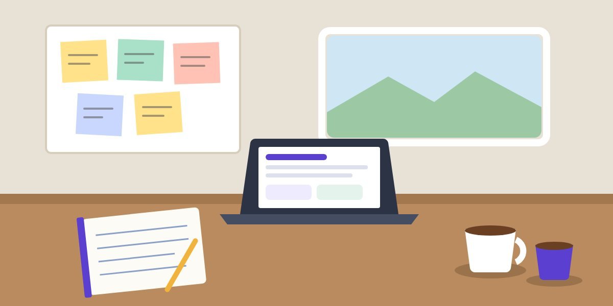 A laptop, notebook and coffee on a meeting table in front of a wall of sticky notes